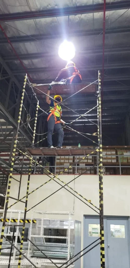 high-bay-led-light-installation-scaffold-warehouse
