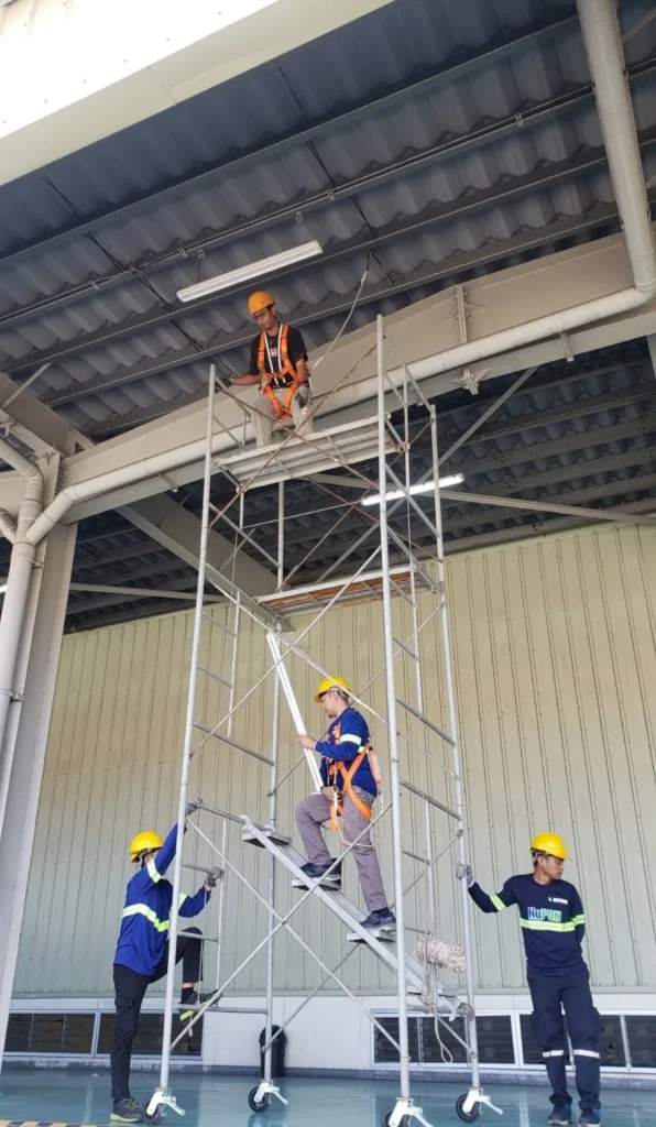 led-fixture-installation-mobile-scaffold-factory-canopy