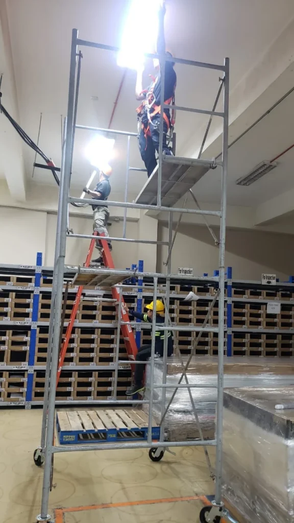 warehouse-high-bay-light-replacement-scaffold-and-ladder